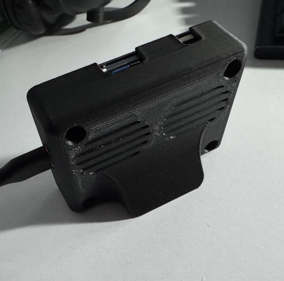 The ESP32-S3 touch alarm clock running the firmware